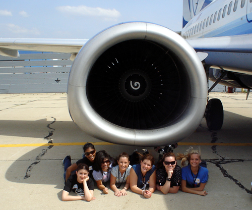 Girls under the engine